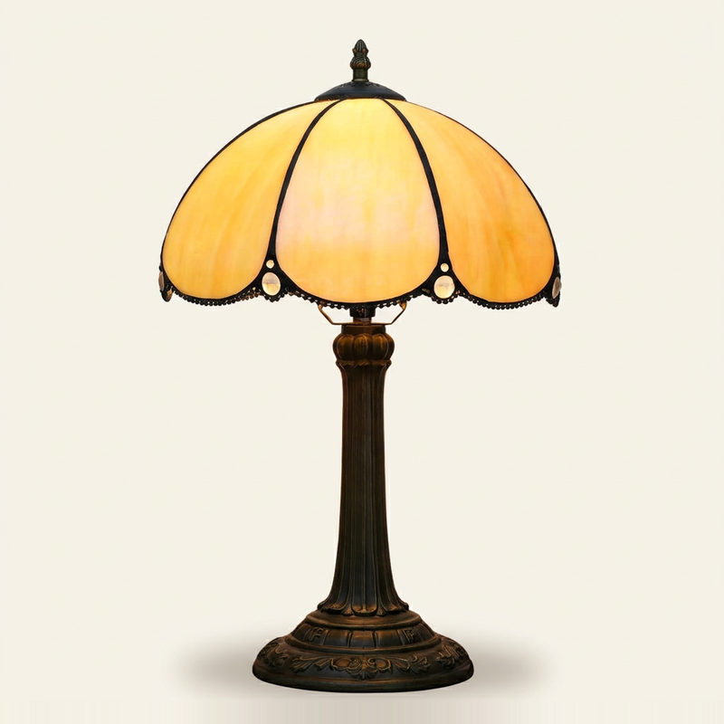 Sienne 12 Inch Tiffany-style stained glass table lamp, Straight Pole base, lit, on a plain ivory studio background