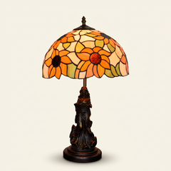 Helia 12 Inch Tiffany-style stained glass table lamp, Angelic Pole base, lit, on a plain ivory studio background