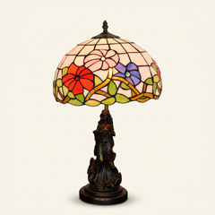 Aurorae 12 Inch Tiffany-style stained glass table lamp, Angelic Pole base, lit, on a plain ivory studio background