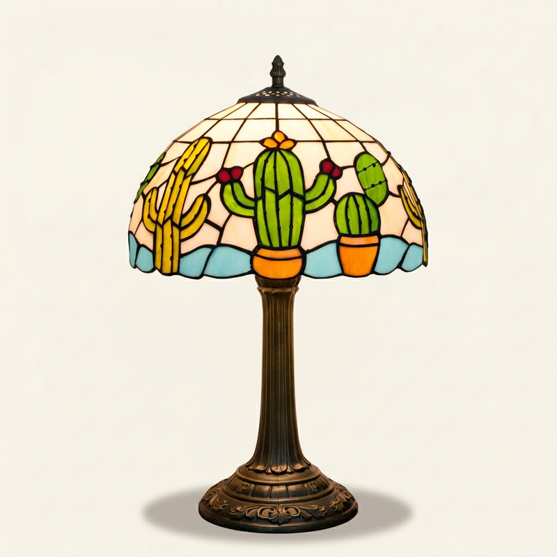 Saguara 12 Inch Tiffany-style stained glass table lamp, lit, on a plain ivory studio background