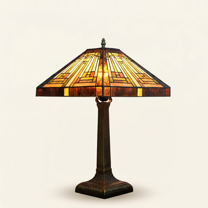 Hamilton 16 Inch Tiffany-style stained glass table lamp, lit, on a plain ivory studio background