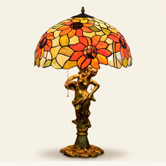 Helia 16 Inch Tiffany-style stained glass table lamp, Angelic Pole base, lit, on a plain ivory studio background