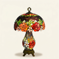 Corvina 16 Inch Tiffany-style stained glass table lamp, Stained Glass Pole base, lit, on a plain ivory studio background
