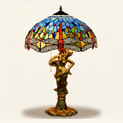 Caelith 16 Inch Tiffany-style stained glass table lamp, Angelic Pole base, lit, on a plain ivory studio background