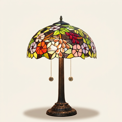 Muscadelle 16 Inch Tiffany-style stained glass table lamp, Straight Pole base, lit, on a plain ivory studio background
