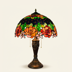 Corvina 16 Inch Tiffany-style stained glass table lamp, Rose Pole base, lit, on a plain ivory studio background