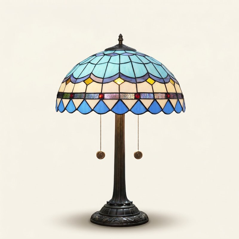 Marbella 16 Inch Tiffany-style stained glass table lamp, Straight Pole base, lit, on a plain ivory studio background