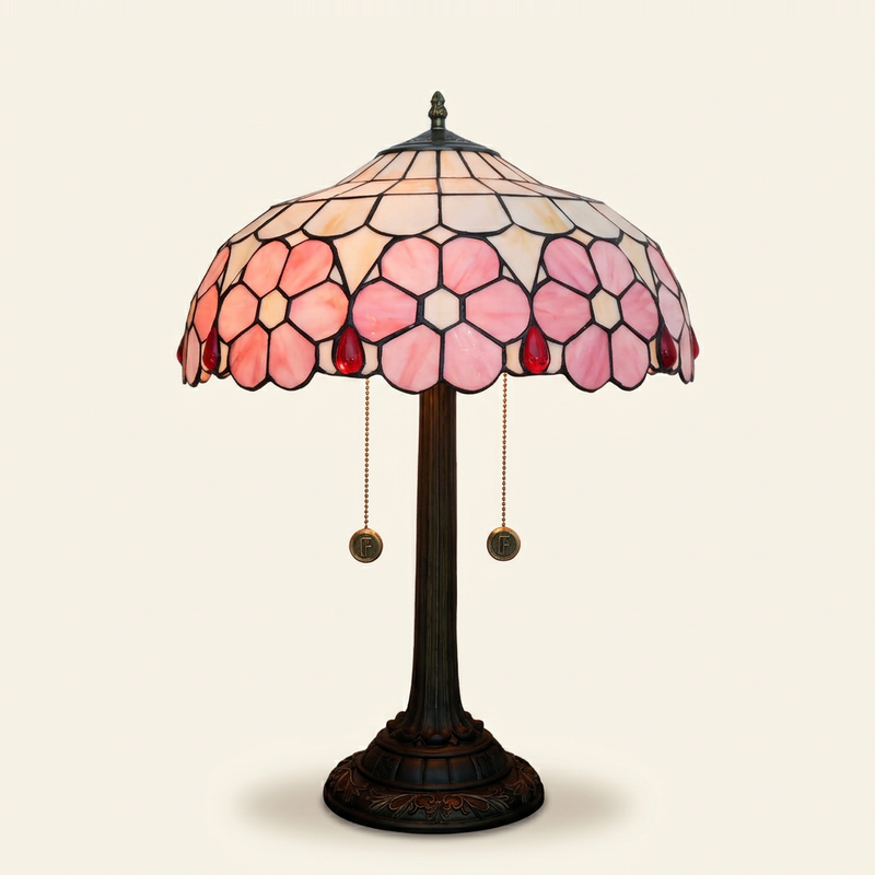 Amaya 16 Inch Tiffany-style stained glass table lamp, lit, on a plain ivory studio background
