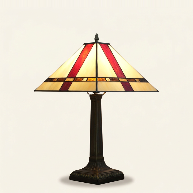 Ellsworth 16 Inch Tiffany-style stained glass table lamp, lit, on a plain ivory studio background