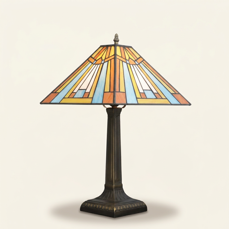 Prisma 16 Inch Tiffany-style stained glass table lamp, lit, on a plain ivory studio background