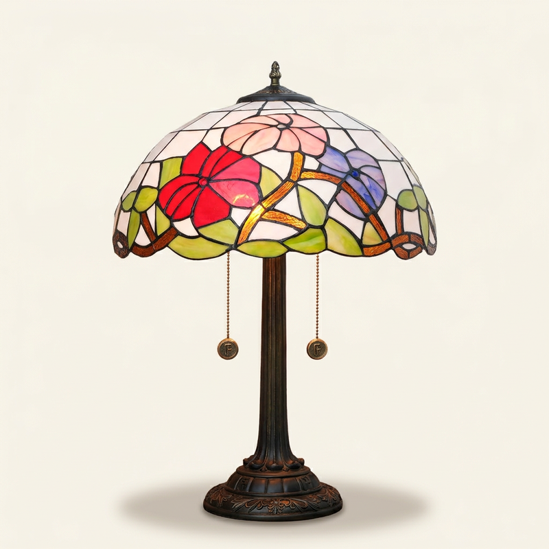Trillora 16 Inch Tiffany-style stained glass table lamp, Straight Pole base, lit, on a plain ivory studio background