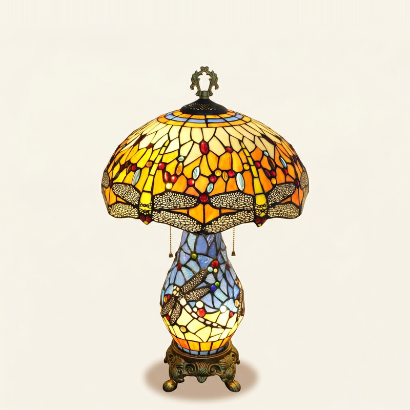 Sundara 16 Inch Tiffany-style stained glass table lamp, lit, on a plain ivory studio background